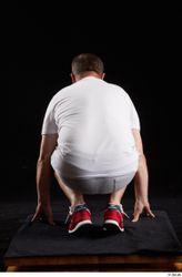 Whole Body Man White Sports Shirt Shorts Chubby Kneeling Studio photo references